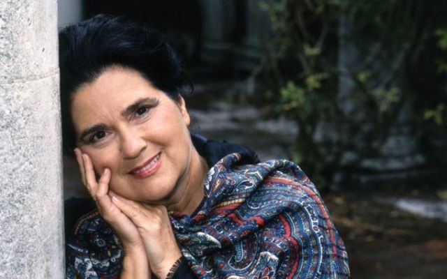 A woman in a shawl.