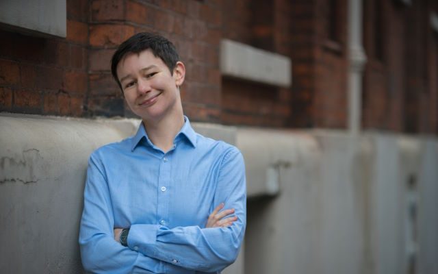 A person in a blue shirt.