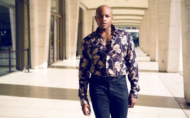 A man in a flowery shirt.