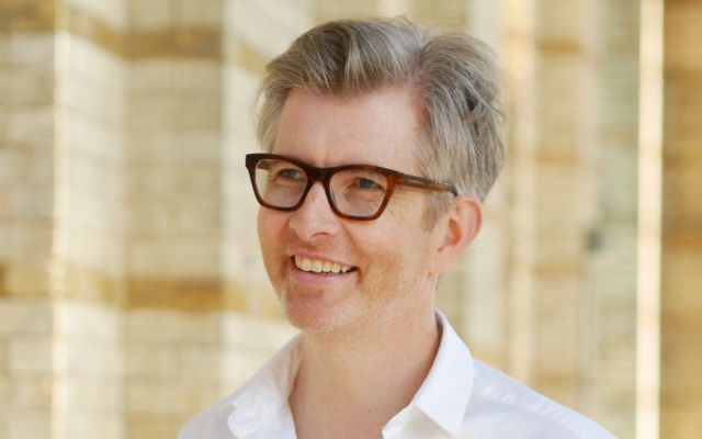 A man wearing glasses.