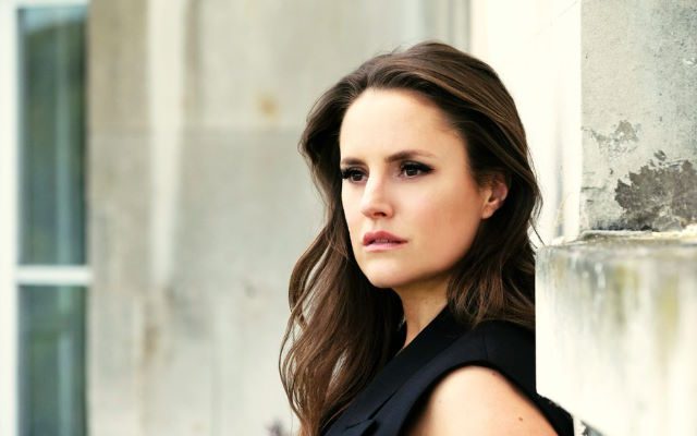 A woman in a black dress.