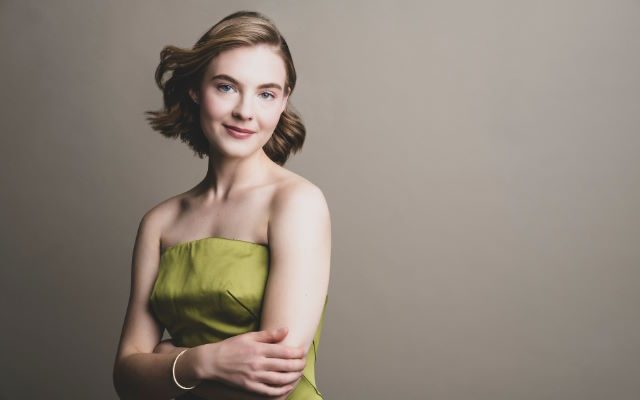 A woman in a yellow dress.
