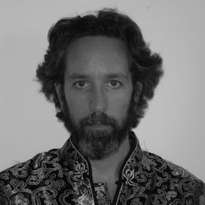 A man with wavy hair.