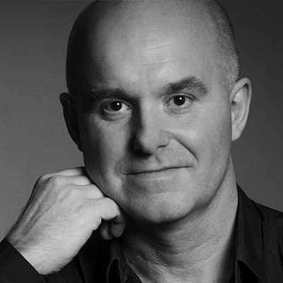 Black and white headshot of Laurence Cummings