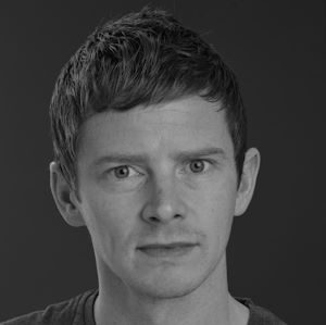 A man with short hair.